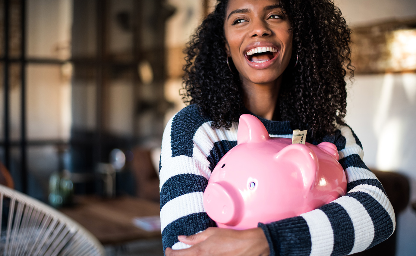 Woman with piggy bank