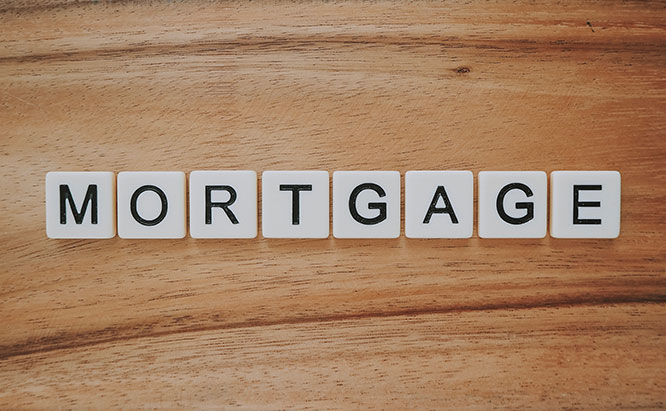 White tiles spelling out 'mortgage'