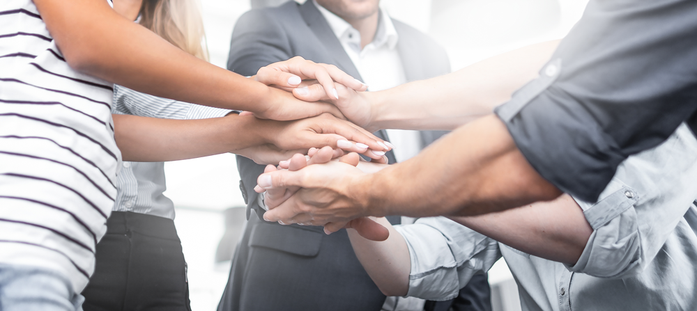 Hand together as a team
