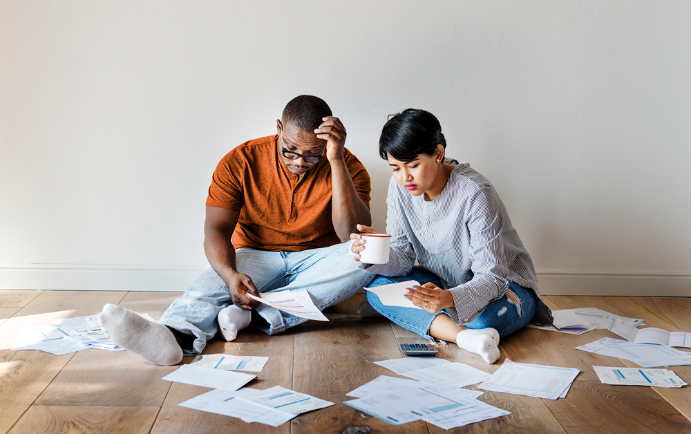 A guys and a girl seeing paper